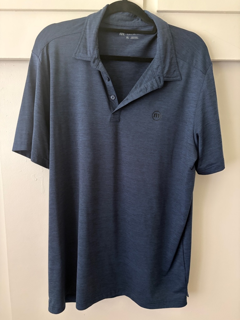 Travis Mathew Men’s Dark Blue Heather Performance Polo